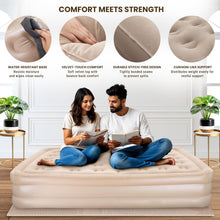 Couple sitting on a beige air mattress with features highlighted.