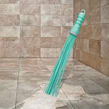 Bathroom floor cleaning broom - plastic hard bristles for scrubbing wet and dry surfaces.